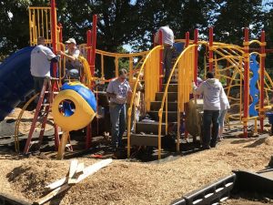Over 200 volunteers gathered at Patton Park in Coatesville Friday morning to assemble a new playground that was designed by children in August.