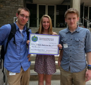 Unionville High students Alan Dembek (from left), Molly Basilio, and Adam Carl show off their second-place prize for “Chances of,” a digital short movie. 