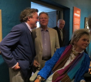 Artist Jamie Wyeth (left) and his wife, Phyllis Wyeth, enjoy conversation with visitors at the Friday opening of his new exhibit at the Brandywine River Museum.