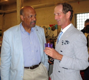 Chester County Commissioner Terence Farrell (left) chats with Don Cochran, president of the Delaware Valley Point-to-Point Association and owner of the warehouse, which served as the venue for the DVA’s annual awards party.