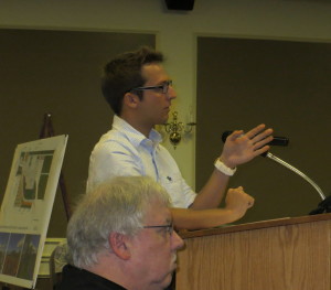 Resident John Thomas (left) listens as Chris Stejskal, an intern at Maffei Landscape Design, LLC., provides Borough Council with an exterior vision for the new Public Works Garage, a plan that incorporates a community garden into the landscape.