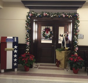 The Chester County Sheriff's Office patriotic holiday door display is now anchored by a new box, where residents can deposit U.S. flags they want to retire.