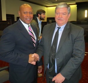 Chester County Det./Lt. Kevin Dykes (left) congratulates retired Coatesville Police Det. Marty Quinn on being named Law Enforcement Officer of the Year.