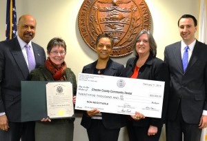 Chester County Commissioner Terence Farrell (from left) joins Chester County Community Dental’s Tamara Fox and Regina Horton Lewis as well as Commissioners Kathi Cozzone and Ryan Costello for a check presentation during Children’s Dental Health Month.
