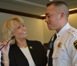 Chester County Sheriff Carolyn "Bunny" Welsh (left) congratulates Lt. Jason Suydam on his promotion.
