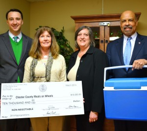 Commissioners Chairman Ryan Costello (from left), Meals on Wheels Director J ,  Commissioner Kathi Cozzone and Commissioner Terence Farrell display the ceremonial check for $10,000.