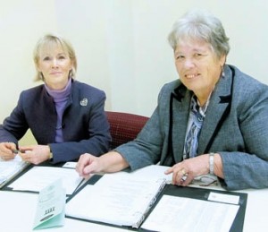 Diane P. Mulhearn (left), and Nancy Breuer, Assistant Orphans’ Court Administrator, review files for the program.  