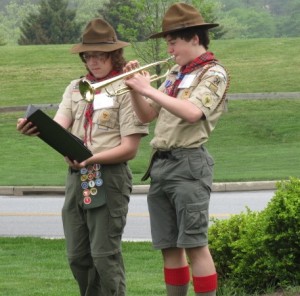 Fellow Boy Scout Zachary Powell (left) holds the music as Harrison Warren plays "America the Beautiful" at the Indian Hannah rededication ceremony at Longwood Gardens.