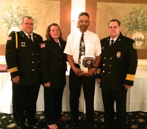 Earl Taylor (third from left) poses with EMS council officers after receiving the BLS Provider of the Year award.