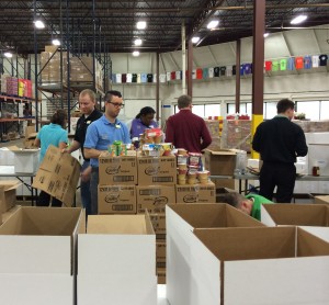The Chester County Food Bank was the site of a massive, high-energy assembly line as volunteers sorted a giant food donation from Wegmans.