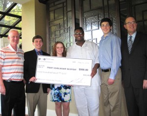 Jim Fris (left), chief operating officer of PJW Restaurant Group; Tim Fris; Mary Higgins; Keyion Briscoe; Mark Shastak; and John Longstreet, president & CEO of Pennsylvania Restaurant and Lodging Association pose for a photo after the scholarship presentation.