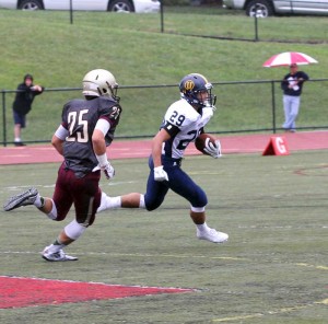 Unionville's Brandon Boon races into the open against Avon Grove Saturday. Boon rushed for 159 yards and scored 3 TD as the Indians won, 36-0. Jim Gill photo.