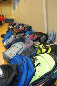 1,500 backpacks were filled with age appropriate school supplies to help students in the CASD get ready for the new school year.