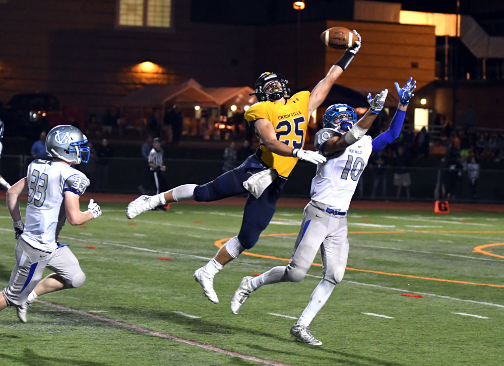 Unionville's Jack Adams makes a crucial one-handed catch over Great Valley's Brendan O'Donnell. Alex Castina Photo.